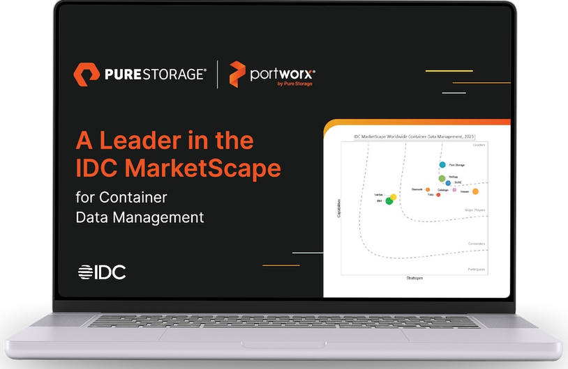 Laptop displaying the IDC MarketScape report cover: A Leader in the IDC MarketScape for Container Data Management